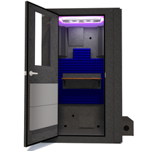 Load image into Gallery viewer, Front view of WhisperRoom&#39;s Voice Over Basic Package - a 4&#39; x 4&#39; single-wall vocal booth, showcasing its acoustic treatment, integrated desk, studio lighting, and additional features. The left-hinged door is open, revealing the interior adorned with vibrant blue StudioFoam.
