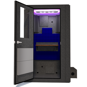 Front view of WhisperRoom's Voice Over Basic Package - a 4' x 4' single-wall vocal booth, showcasing its acoustic treatment, integrated desk, studio lighting, and additional features. The left-hinged door is open, revealing the interior adorned with vibrant blue StudioFoam.
