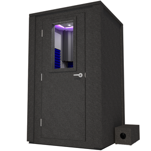 Angled view of the WhisperRoom's Voice Over Deluxe Package - a 4' x 4' double-wall vocal booth, meticulously designed with acoustic treatment, a functional desk, studio lighting, and a comprehensive range of premium features. The left-hinged door is closed, and the interior is accentuated with vibrant blue StudioFoam, creating an ideal recording environment.