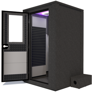 Side view of the WhisperRoom's Voice Over Deluxe Package - a 4' x 4' double-wall vocal booth, thoughtfully equipped with acoustic treatment, a functional desk, studio lighting, and an array of premium features. The left-hinged door is open, revealing the interior enhanced by sophisticated gray StudioFoam, creating an ideal recording atmosphere.