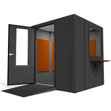 Load image into Gallery viewer, Audiology Deluxe Package shown angled from the front with left hinge door open and orange foam.
